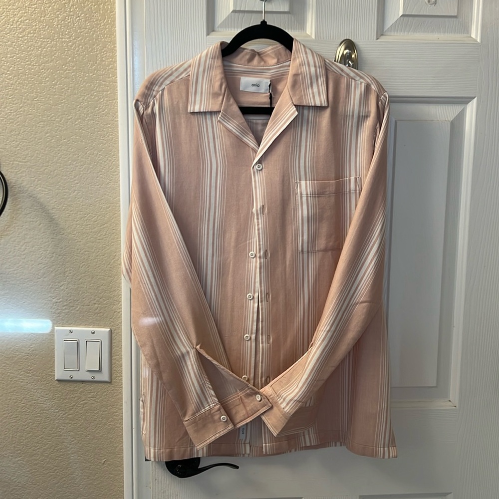 wear as a long sleeve our rolled the sleeves up. Great piece for summer outfits